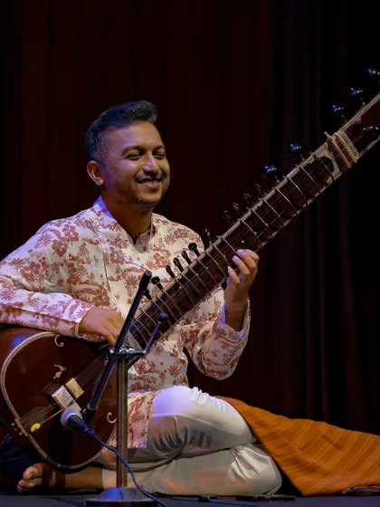 The energy on stage with the Anirudh Varma Collective is electric. This photo captures a moment of shared joy during our performance at the India Habitat Centre, where traditional Indian classical music meets contemporary arrangements.