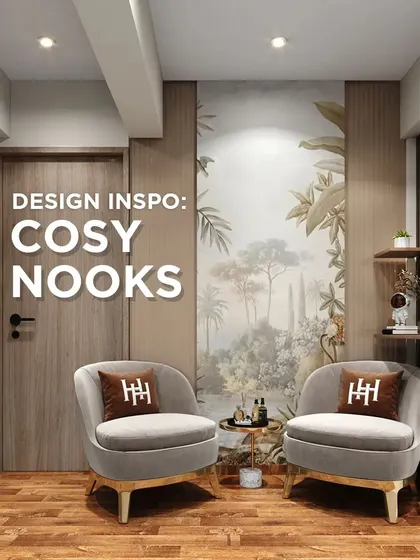 We love creating cozy nooks for conversation or quiet reflection. This setup with two plush armchairs and a nature-inspired mural is a perfect example.