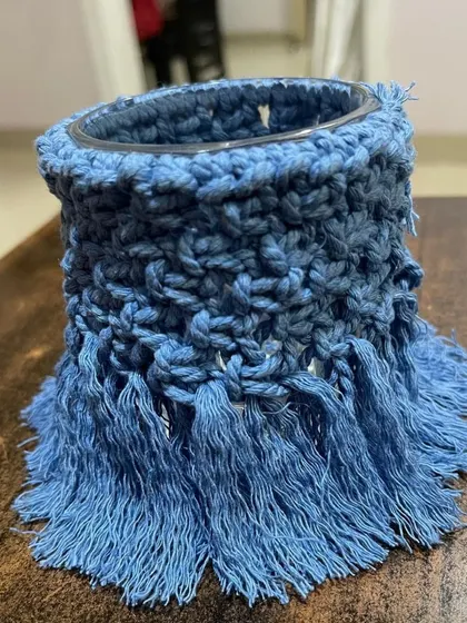 Another fantastic macrame jar made by a student in a lovely shade of blue. The texture and fringe are just perfect.