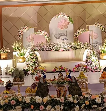 A serene and elegant platter display with a pink lotus theme. The soft colors and floral elements create a peaceful and beautiful atmosphere for the ceremony.