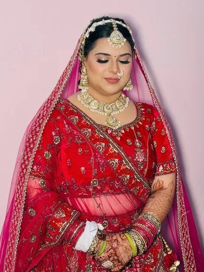 Showcasing the soft glam bridal makeup with eyes closed. This view highlights the smooth eyeshadow blending and false lash application, essential skills for any makeup artist.