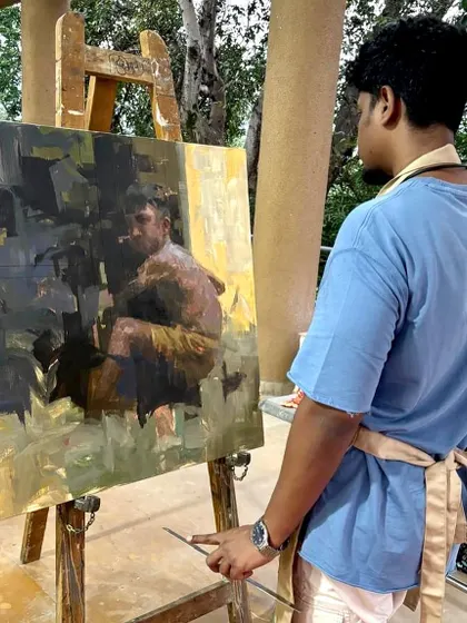 Here I am with the finished painting "HOPE II" at a monsoon art camp in Lonavla. The piece, showing a young boy with his pigeons, is a meditation on childhood, nature, and hope.