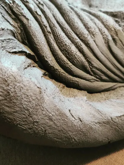 The texture of the canvas on my work surface is imprinted on the clay during kneading. This stage of preparation is meditative and foundational to everything I make.
