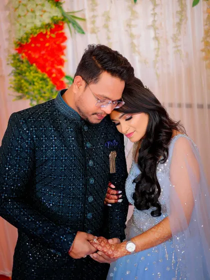 A tender moment between the couple, perfect for capturing the romance of the day.