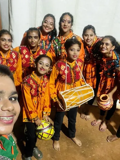 A selfie with the crew. A fun, behind-the-scenes moment with our dance team before a performance.