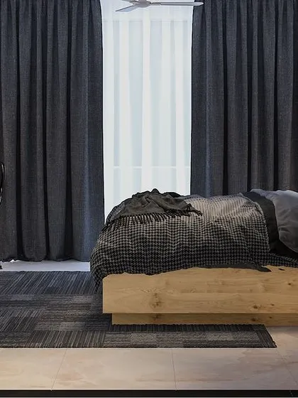 A cozy bedroom design with earthy tones, wooden furniture, and a dedicated study nook. The dark curtains create a cozy, den-like feel.
