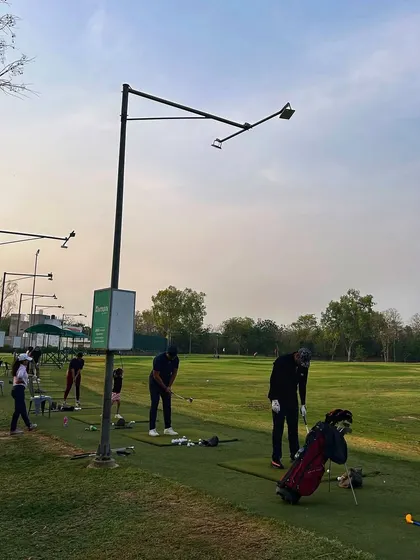 The range at dusk is a peaceful yet focused environment for practice.