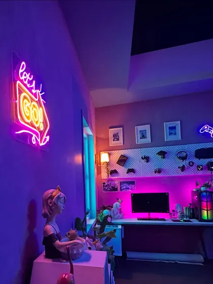 A shot of the neon-lit gamer room set we built. The art direction and lighting are crucial elements that I collaborate on to ensure the styling fits the world perfectly.