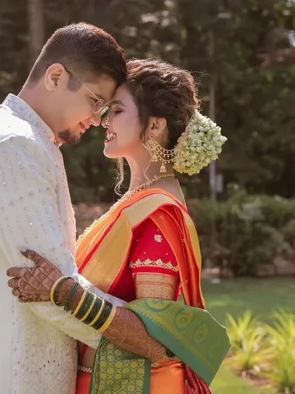 An intimate embrace. These close-up shots highlight the emotional bond and the happiness of the wedding day.