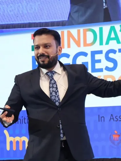 I believe that educating people is as important as treating them. Here I am speaking at a seminar, mentoring students and parents. Being a trusted authority in the field of dermatology means sharing knowledge and helping people make informed decisions about their health.