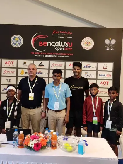 Our junior players with officials and professional athletes at the Bengaluru Open draw ceremony. This highlights our strong relationships within the professional tennis community.