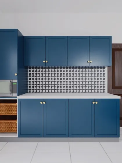 This view shows the utility area of the English-inspired kitchen, with continued Prussian Blue cabinetry and wicker baskets for vegetable storage. The design ensures that even functional spaces are stylish.