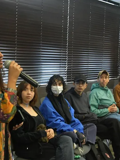 Leading a vocal session with an engaged group of learners. My goal is to create a comfortable space where everyone feels they can participate, listen, and contribute to the music we're making.