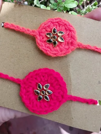 For a touch of elegance, I offer these crochet kundan rakhis. They combine traditional craft with a bit of sparkle.