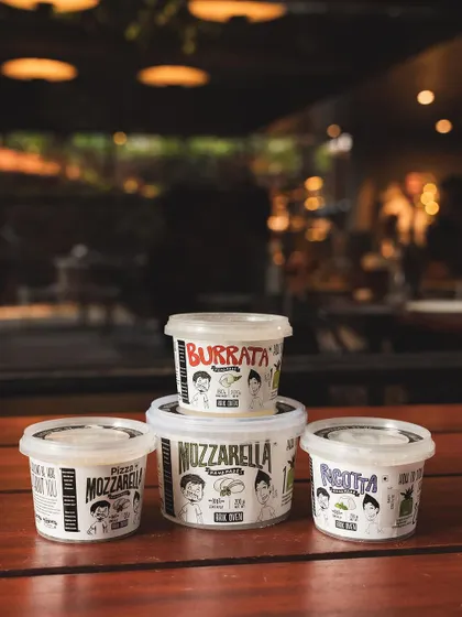 Bring us home! Our full range of handcrafted cheeses, including mozzarella, burrata, and ricotta, is available in our deli packaging to take home and enjoy.