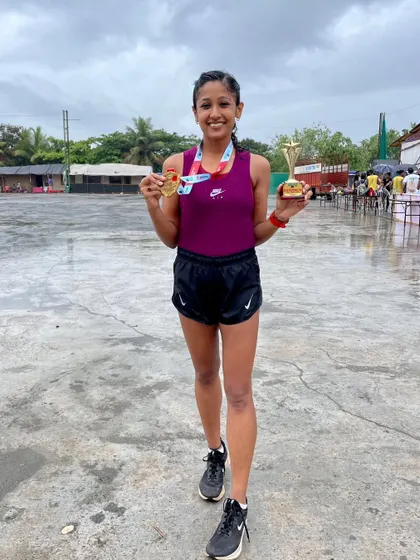 A podium finish and a trophy after a 10km race in the heavy rain. My coaching teaches you to race with a challenger mindset, no matter the weather.
