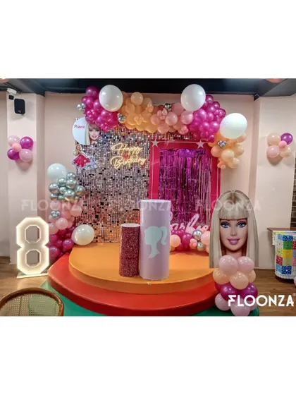 A complete Barbie-themed birthday party setup for an 8th birthday celebration. I handled everything from the silver sequin and pink fringe backdrop to the custom Barbie cutouts, marquee number, and themed cake pedestals.