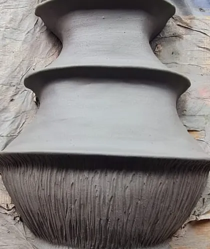 A process video showing the artist hand-crafting the ceramic pieces for the 'Love is a Wave' installation. This behind-the-scenes glimpse highlights the skill and dedication that goes into our collaborative art pieces.