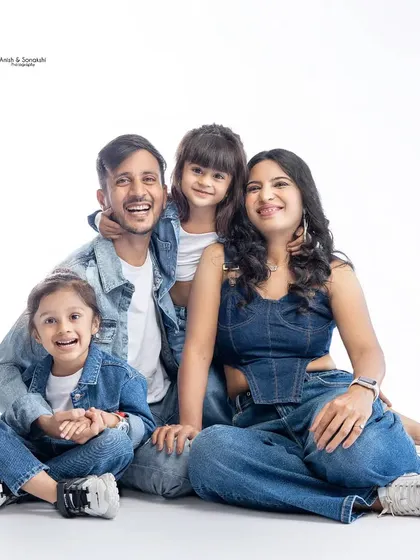 Our studio is the perfect place for a fun, modern family portrait. We had a blast with this adorable family, all styled in denim for a classic yet playful look.