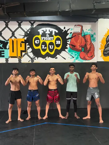 Another powerful shot of Team FFC, showing the strength and unity of our fighters.