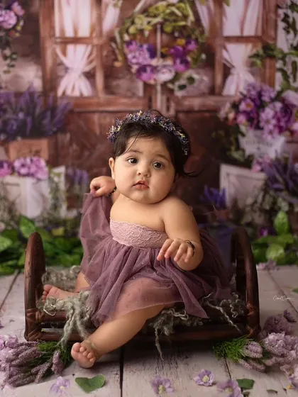 This little beauty is just breathtaking. Her pose and expression are so perfect in this rustic, lavender-filled scene.