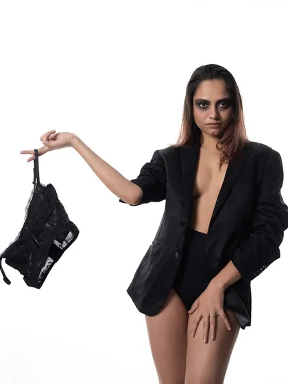 A shot from my "BACK TO BLACK" series. This conceptual image plays with the idea of business casual in a bold, deconstructed way.
