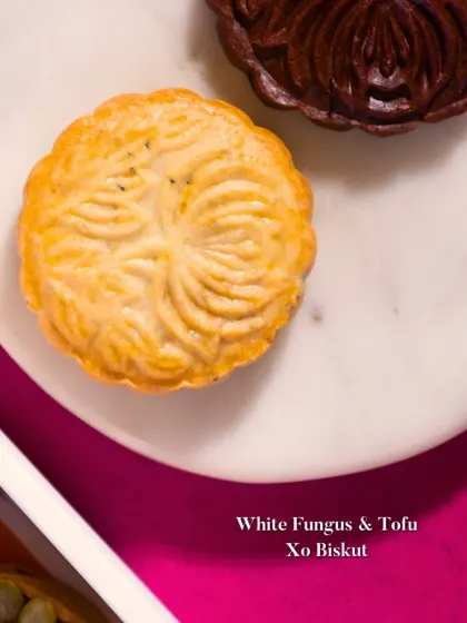 A White Fungus & Tofu XO Biskut, inspired by the texture of mooncakes. A unique savory bite with complex umami flavors.