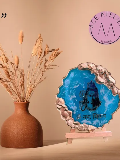 This 5-inch Mahadev frame features a geode-style border and the 'Om Namah Shivaya' mantra. It's a compact yet powerful piece for your desk or car.
