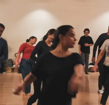 We are a vibe. A candid shot of our class in motion, where the focus is on the shared experience of movement.