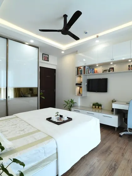A full view of the bedroom layout, showing how the furniture placement and lighting design work together to create a harmonious and functional space.