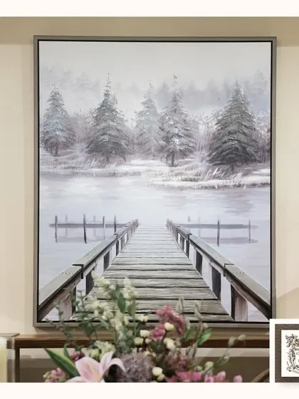This hand-painted canvas captures a serene, misty winter scene with a wooden pier. It's a beautiful piece that brings a sense of calm and nature's beauty into your home.