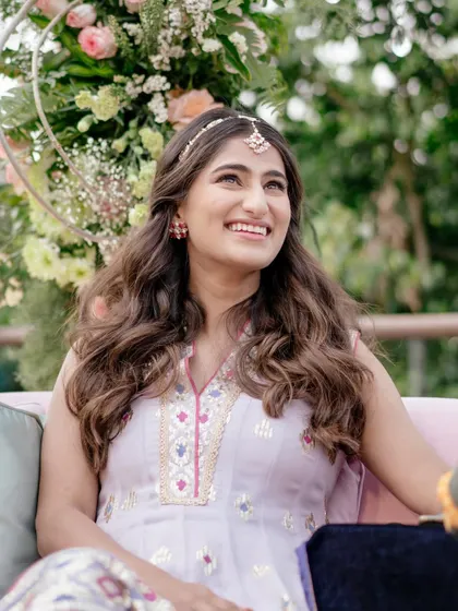 Another smiling portrait of Sneha. We coordinated the outfits for all the close family and friends to match the pastel theme, creating a beautiful, cohesive look for the photos.