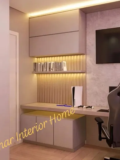 A close-up of the desk and overhead storage.