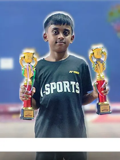From amateur to advanced. Anirvan holds his two runner-up trophies from the Dharmapuri District Badminton Championship, his first recognition from the Tamil Nadu Affiliated Association.