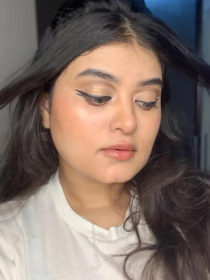 A downward glance to show the full effect of the winged liner.