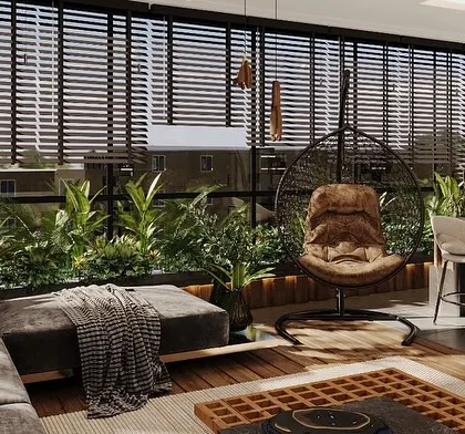 A closer look at the lounge area within a terrace sunroom, featuring a comfortable sectional sofa and a hanging chair. The adjustable blinds offer privacy while allowing for ample natural light.