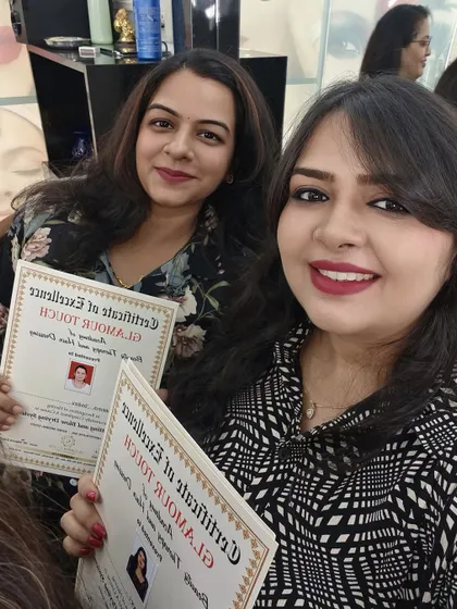 Two of my students proudly showing their Certificates of Excellence. This is the reward for all their hard work and practice.