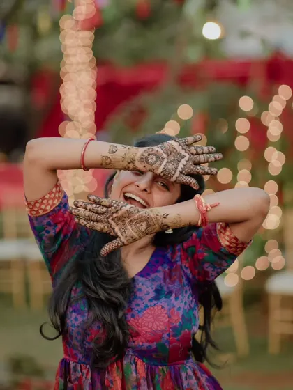 A playful moment from a bride at her mehendi party. My goal is to create a fun and relaxed environment where you can be yourself and truly enjoy the day.