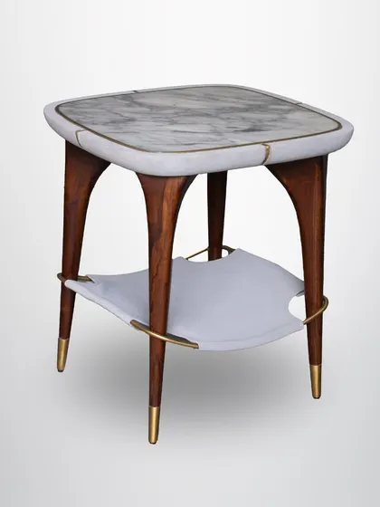 A full view of the swing shelf table, showcasing its mid-century inspired wooden legs and the beautiful combination of marble, wood, leather, and brass.