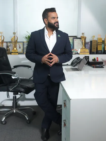 A confident, standing portrait in my office. My goal is to bring a high level of professionalism and creativity to your pre-wedding shoot.