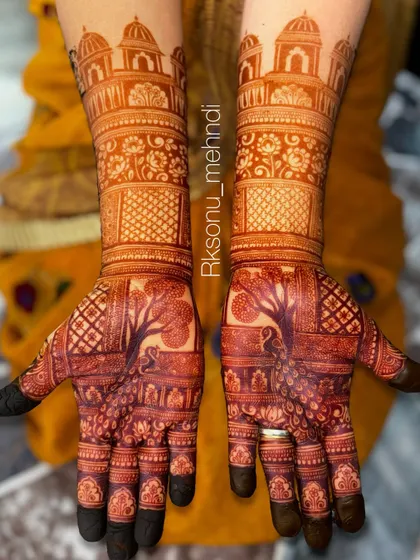 The rich, dark stain of the full-arm bridal design with the tree of life and palace domes. This is the beautiful color you can expect from my herbal henna with good aftercare.