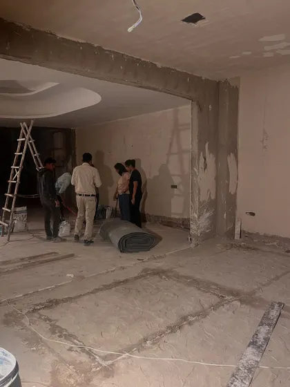 Our team on-site during the marble flooring installation. We conduct these visits to verify material quality, check measurements, and ensure the layout and installation meet our exacting standards for precision and accuracy.