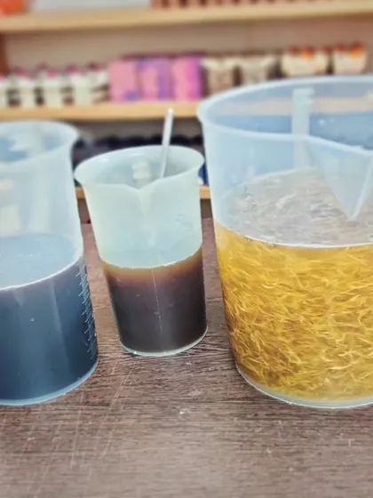 The beautiful, rich colors of Alkanet, Himalayan rhubarb, and calendula infused in oil, ready for natural soap making.