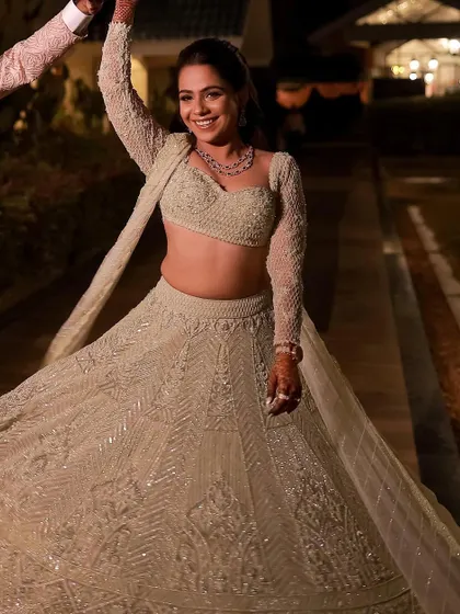Makeup should feel so good you can't help but dance. This candid shot captures the pure joy of a client at her sangeet, with a luminous look that stays flawless all night long.