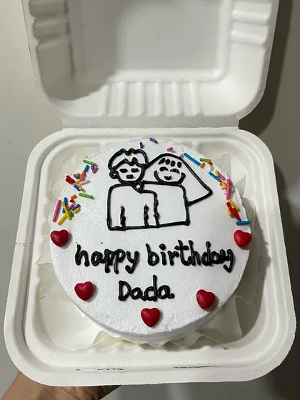 Another variation of the cute couple drawing on a birthday bento cake.