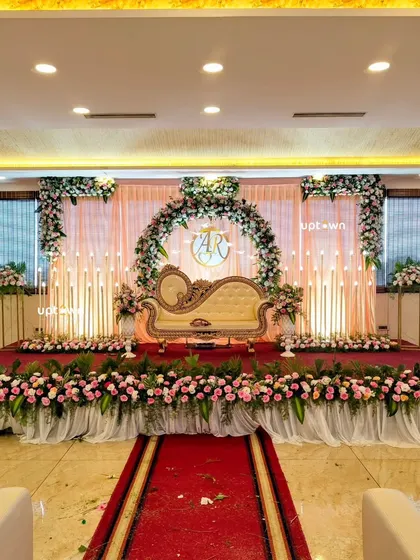A complete view of the pink floral engagement stage.