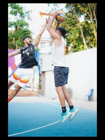 Challenging a shot at the rim. Defense is half the game, and I emphasize the importance of defensive intensity and technique.