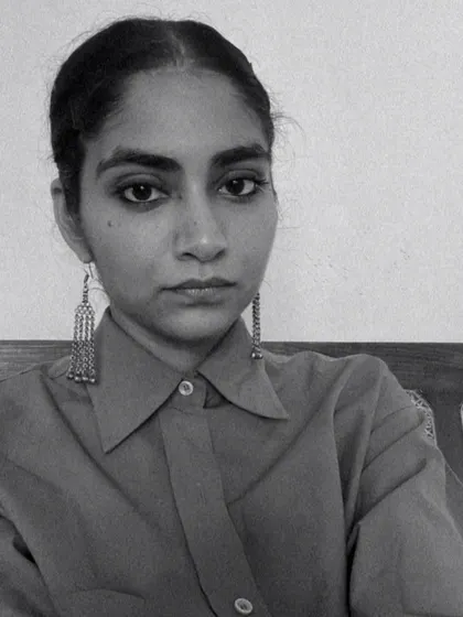 A black and white portrait of artist Avnit Singh, whose open studio offered a space for solace and reflection through her watercolour series.