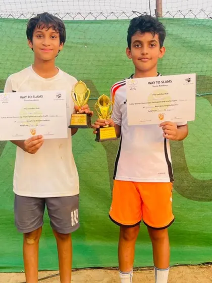 Reyansh Gandhi and his partner Arya Singh Bisht as runners-up at the Boys U12 Doubles final of an AITA Championship Series tournament.
