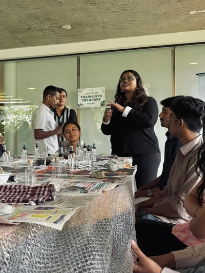 Our team engaged in a hands-on 'Trash into Treasure' workshop, learning about upcycling and sustainable practices.